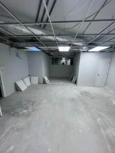 commercial space ceiling floor and wall unfinished with exposed ducts in Miami