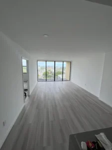 New vinyl flooring and painted walls in Miami apartment renovation