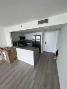 Newly installed kitchen cabinets and quartz countertop - Miami apartment